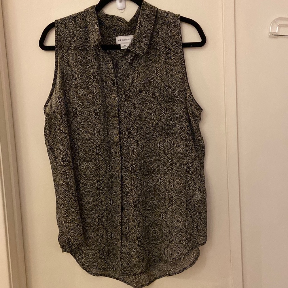 Liz Claiborne black and white sheer blouse. It buttons down with a pocket.